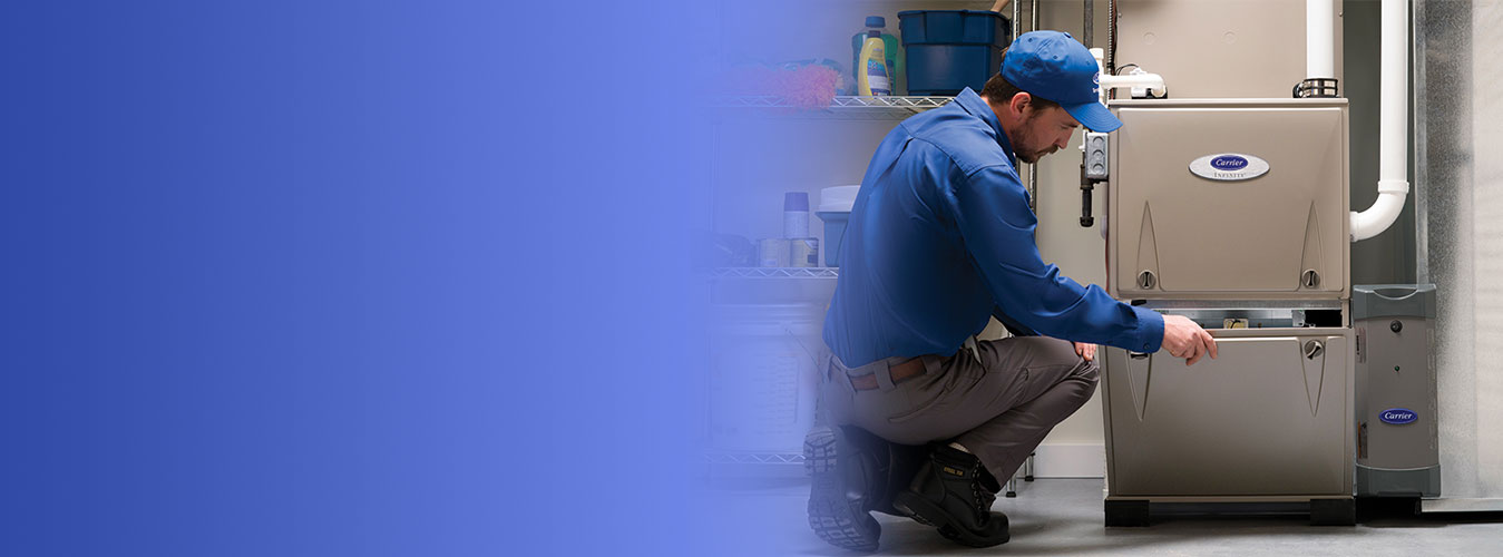 Furnace making noise: technician checking a noisy gas furnace in a Durham basement