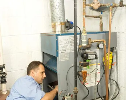 Gas vs electric furnace: a home furnace serviced by Aire One East in a Durham home
