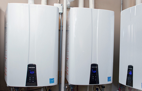 Water heater maintenance check, flushing and inspecting a tank in a Durham home