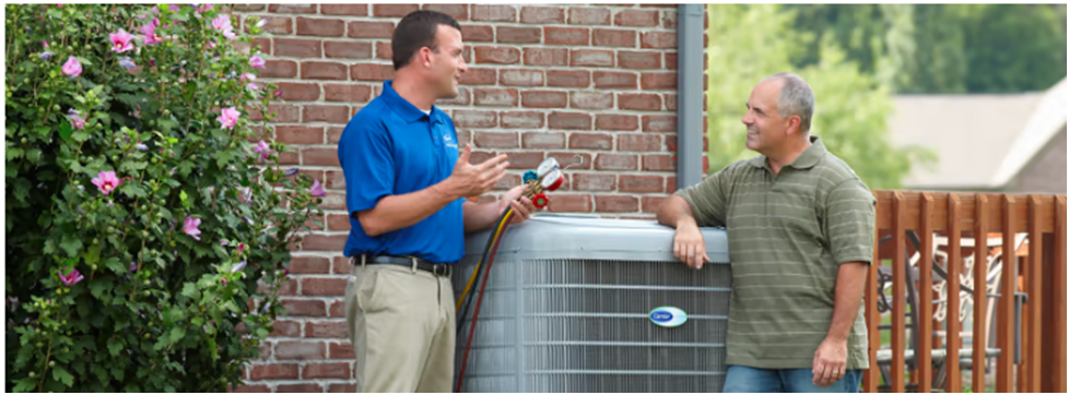 Renting an air conditioner Whitby, a homeowner reviewing rental options with Aire One East